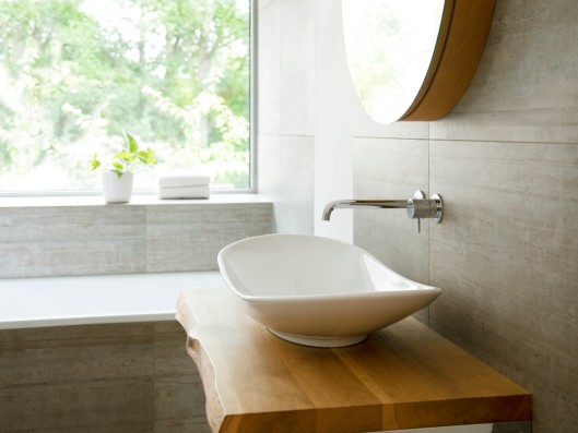 View from a bathroom over the sink to the window outside