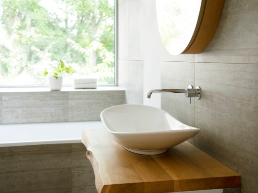 View from a bathroom over the sink to the window outside